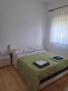 Postel nebo postele na pokoji v ubytování Apartments Berny