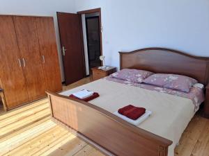 Postel nebo postele na pokoji v ubytování Apartments Berny