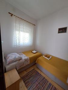 Postel nebo postele na pokoji v ubytování Apartments Berny