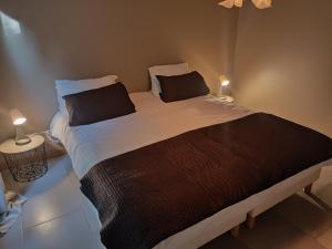 מיטה או מיטות בחדר ב-Casa del Sol