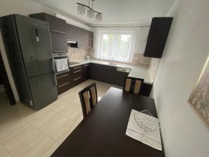 Kuchyň nebo kuchyňský kout v ubytování Lovely apartment - Žilina centrum