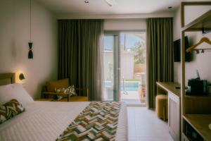 Voodi või voodid majutusasutuse Eterrano Seaside Retreat toas +37 fotot