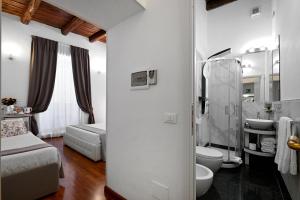 Kúpeľňa v ubytovaní Notti A Roma