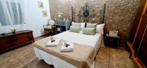 Łóżko lub łóżka w pokoju w obiekcie Vivienda Vacacional La Morada El Paso