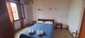 Posteľ alebo postele v izbe v ubytovaní Molivos Castle Apartments