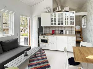 Kuchyň nebo kuchyňský kout v ubytování Holiday home SÖLVESBORG XVI