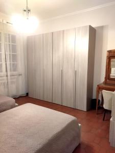 A bed or beds in a room at VILLA MOLINELLA
