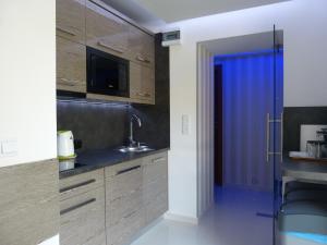 Kuchyň nebo kuchyňský kout v ubytování ASENATA pokoje & apartamenty centrum Ustroń
