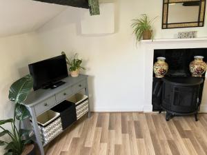 Μια τηλεόραση ή/και κέντρο ψυχαγωγίας στο Bells yard Cottage Maryport
