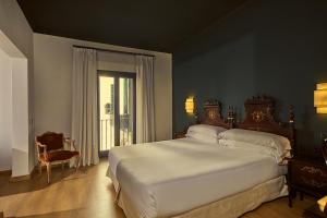 Postel nebo postele na pokoji v ubytování Hotel Born
