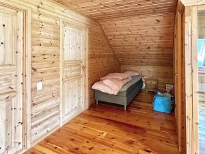 Postel nebo postele na pokoji v ubytování Holiday home Bakka