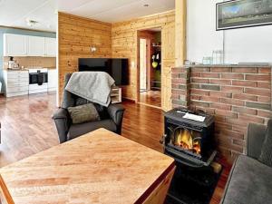 Posezení v ubytování Holiday home Bakka + 15 fotografií