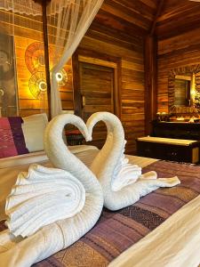 Cama ou camas em um quarto em Viking Nature Resort