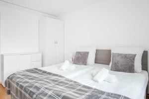 Postel nebo postele na pokoji v ubytování Cocoon am Schloß