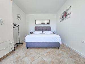 Postel nebo postele na pokoji v ubytování Apartments Vuković Vanja