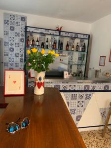 Nápoje v ubytování Hotel Migani
