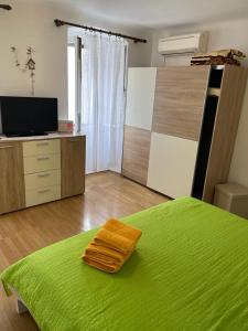 Postel nebo postele na pokoji v ubytování Đana