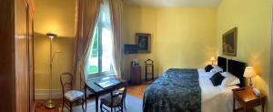 Letto o letti in una camera di Château Maucaillou