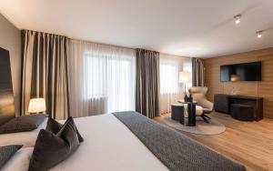 TV o dispositivi per l'intrattenimento presso Biancaneve Family Hotel