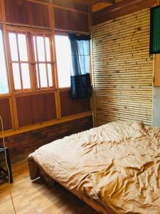 Giường trong phòng chung tại Sapa Guide Homestay & Trekking