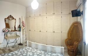 A bed or beds in a room at VILLA MOLINELLA