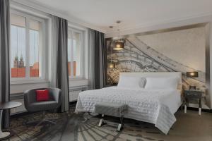 Postel nebo postele na pokoji v ubytování Le Méridien Grand Hotel Nürnberg