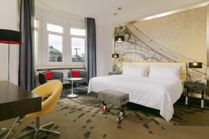 Postel nebo postele na pokoji v ubytování Le Méridien Grand Hotel Nürnberg + 37 fotografií