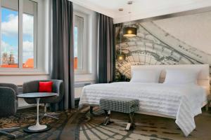 Postel nebo postele na pokoji v ubytování Le Méridien Grand Hotel Nürnberg