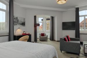 TV a/nebo společenská místnost v ubytování Le Méridien Grand Hotel Nürnberg