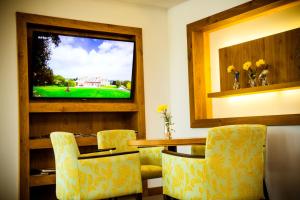 TV a/nebo společenská místnost v ubytování Hotel Konradshof