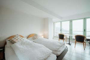 Postelja oz. postelje v sobi nastanitve Hotel Sonne