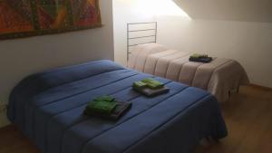 Säng eller sängar i ett rum på Rifugio piemontese