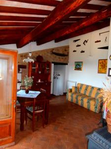 a living room with a couch and a table at Casa Bacci in Siena
