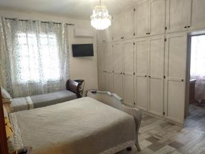 A bed or beds in a room at VILLA MOLINELLA