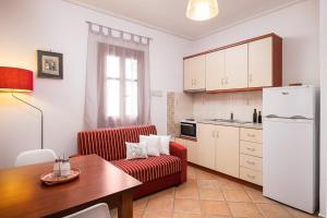 Η κουζίνα ή μικρή κουζίνα στο Chalki Apartments - Naxos