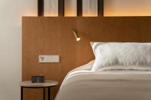 Postel nebo postele na pokoji v ubytování Nema Boutique Hotel & Spa