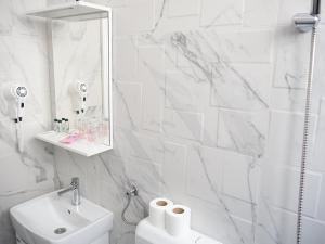 Koupelna v ubytování Motel Rezime + 26 fotografií
