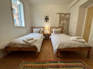 Łóżko lub łóżka w pokoju w obiekcie 5c Luxury Apartment Rovinj