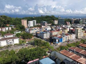 an aerial view of a city with buildings at Summer Studio Apartment at Kota Kinabalu City Centre in Kota Kinabalu