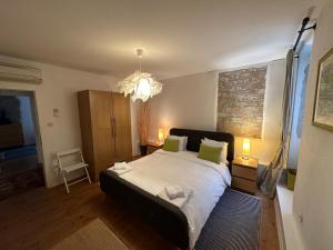 Łóżko lub łóżka w pokoju w obiekcie 5c Luxury Apartment Rovinj