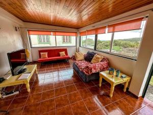 Χώρος καθιστικού στο Luana House