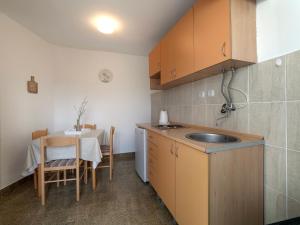 Kuchyň nebo kuchyňský kout v ubytování Apartments Krš Medinski