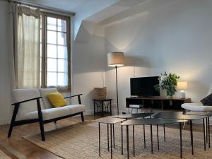 Telewizja i/lub zestaw kina domowego w obiekcie La Petite Maison du 9