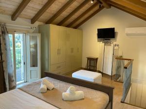 Postel nebo postele na pokoji v ubytování KATSANTONIS LUXURY HOUSE