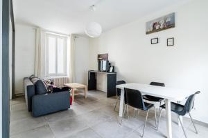 Kuchyňa alebo kuchynka v ubytovaní Maison de ville pour 7 personnes + 10 fotografií