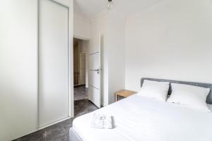 Posteľ alebo postele v izbe v ubytovaní Maison de ville pour 7 personnes