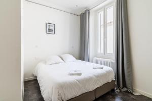 Posteľ alebo postele v izbe v ubytovaní Maison de ville pour 7 personnes