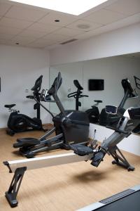 a gym with several exercise bikes in a room at ONOMO Hotel Tanger Med in Tangier
