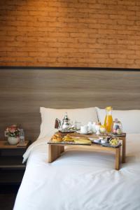 Ліжко або ліжка в номері ONOMO Hotel Tanger Med