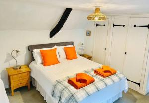 Postel nebo postele na pokoji v ubytování Character home near Lyme Regis